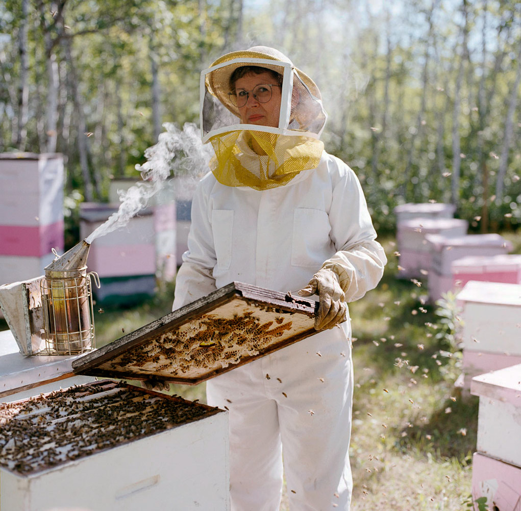 Beekeeper by winnipeg editorial photographer