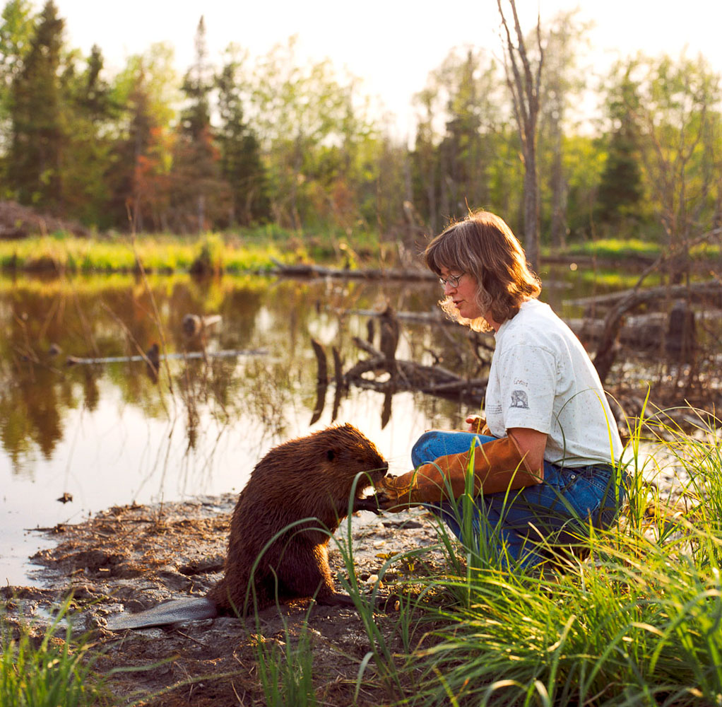 Woman with beaver by Winnipeg editorial photographer