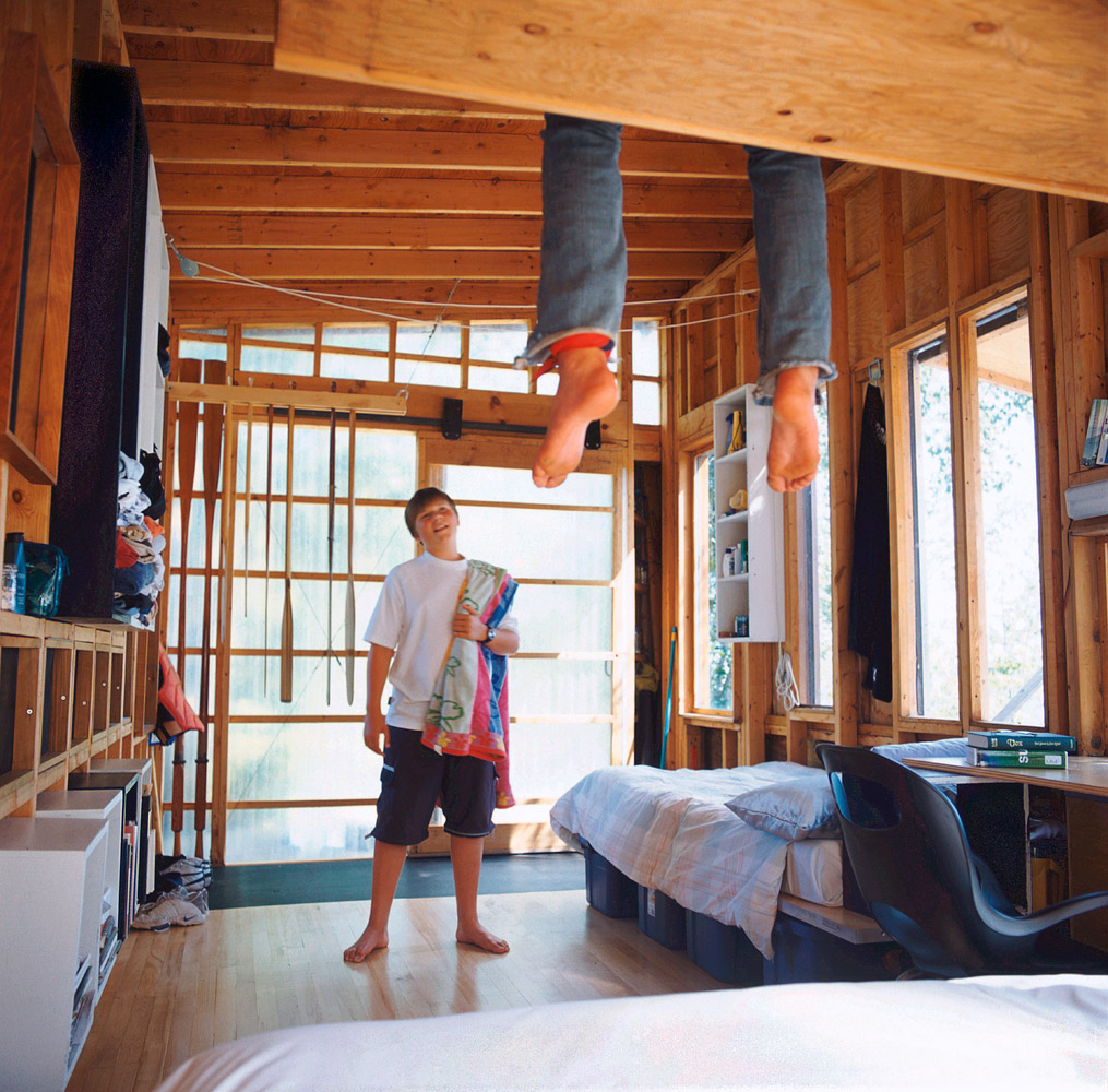 Feet over cabin bunk by Winnipeg editorial photographer