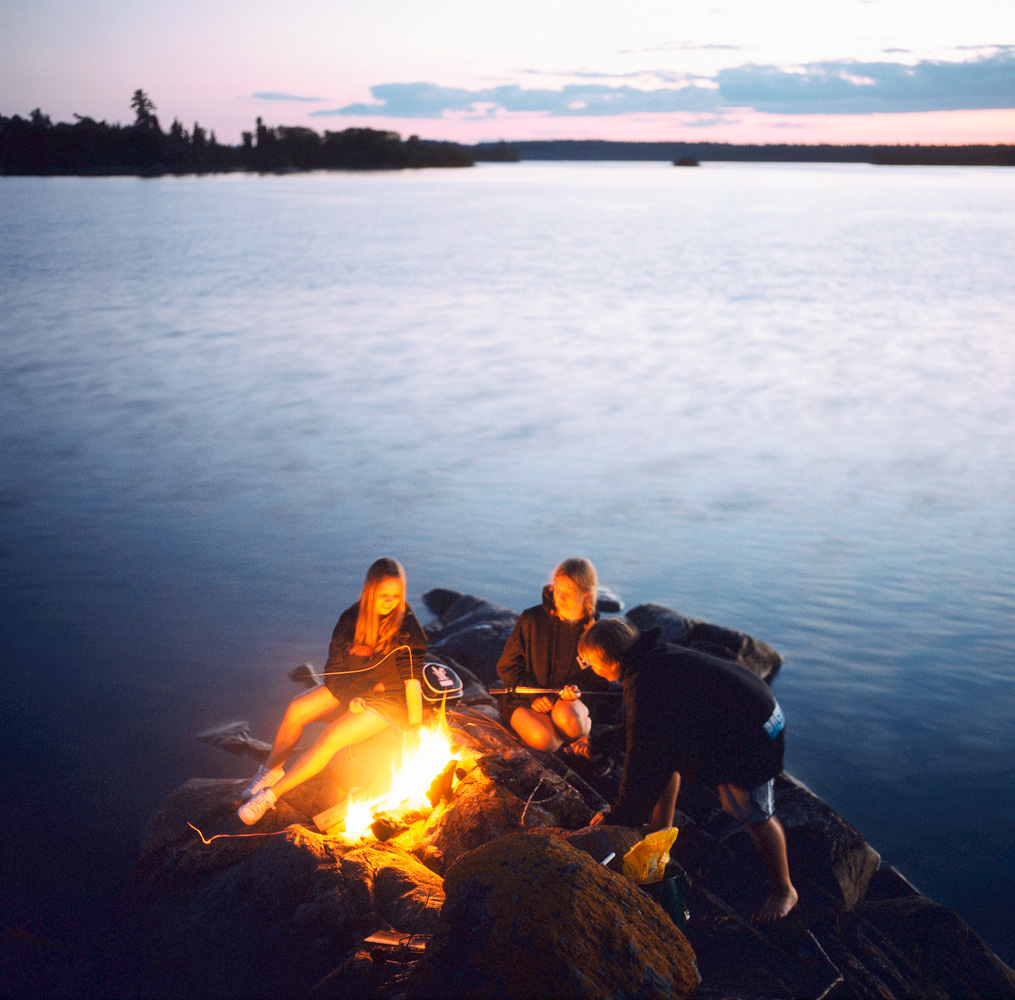 Lakeside bonfire by Winnipeg editorial photographer