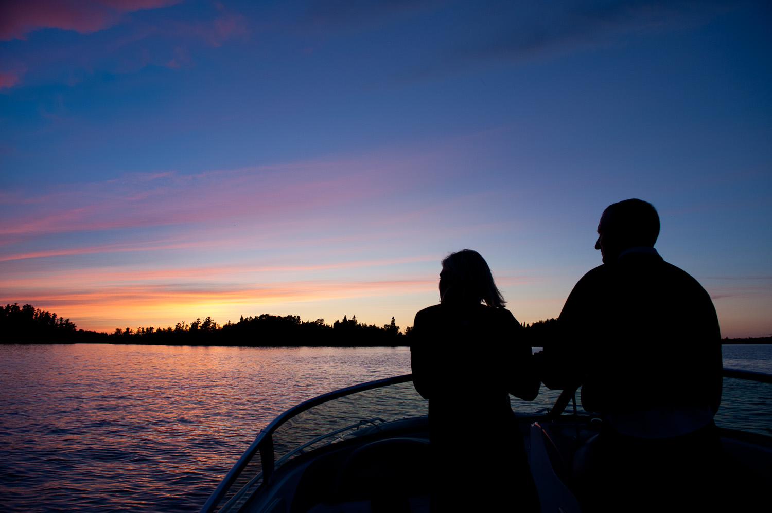 Lake silhouette by Winnipeg editorial photographer