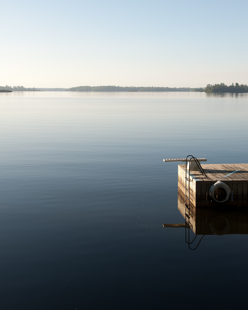Lake diving board by Winnipeg editorial photographer