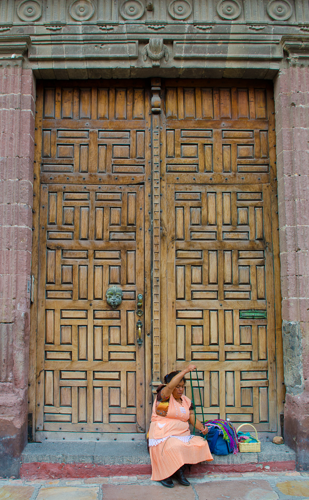 Doorway knitter by Winnipeg travel photographer